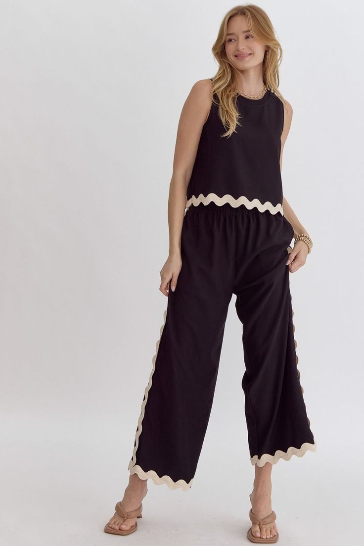 Solid high waisted wide leg pants and sleeveless top set -ric rac detail -lightweight -unlined -Fabric Content- 95% polyester, 5% spandex Black Wide Leg Summer Sets, Black Spring Sets With Straight Pants, Black Straight Pants Set For Spring, Casual Sleeveless Sets With Elastic Waistband, Chic Viscose Pants For Vacation, Chic Wide-leg Pants Sets, Sleeveless Black Sets For Spring, Chic Cropped Pants Two-piece Set, Cotton Wide Leg Pants Matching Set