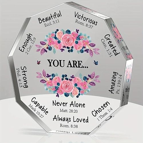 a clear glass award with pink flowers and the words you are engraved on each side