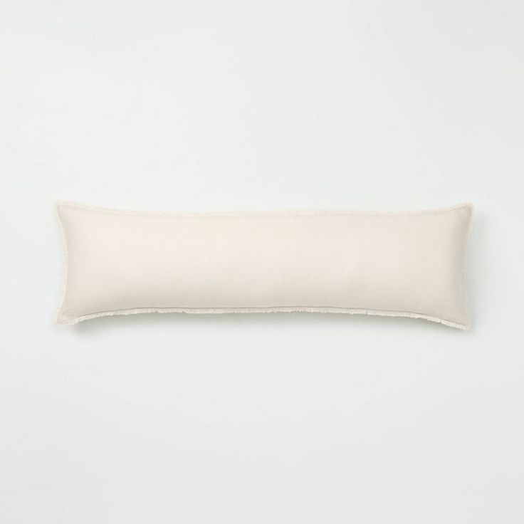 a white pillow on a white background