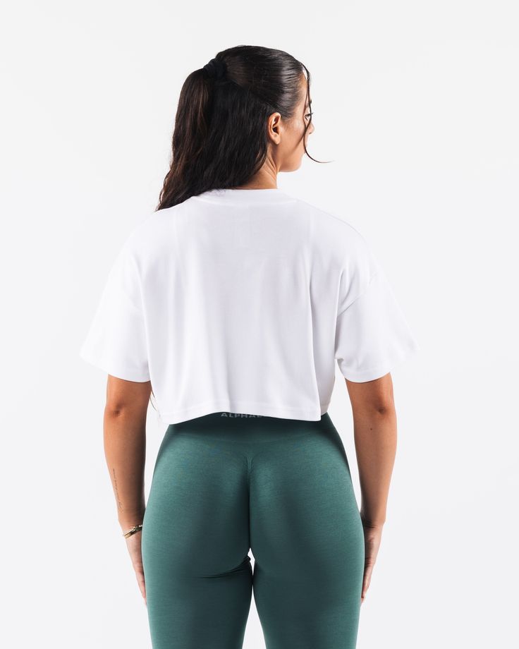 HIGHLIGHTS. Relaxed fit Foam print Cotton interlock Lightweight & Flexible FIT SUGGESTION. This item runs true to Alphalete's standard sizing.. We recommend sizing up for a more relaxed fit or down for a more compressive fit.. Model is 5’8”/172.2cm, wearing a size S.. with. 36"/91.4cm bust. MATERIALS AND WASHING DIRECTIONS. 100% Cotton.. We recommend washing inside-out on a cold setting. Hang to dry DESCRIPTION Introducing Republic - the perfect merge of style and performance. Made with 100% cot Cotton Athleisure Cropped T-shirt For Workout, Basic Moisture-wicking Tops For Loungewear, Basic Crew Neck Top With Athletic Fit, Basic Short Sleeve Tops With Athletic Fit, Basic Athletic Fit Crew Neck Top, Basic Short Sleeve Athletic Fit Tops, Basic Athletic Fit Short Sleeve Tops, White Cropped T-shirt For Workout, White Go-dry T-shirt In Athleisure Style