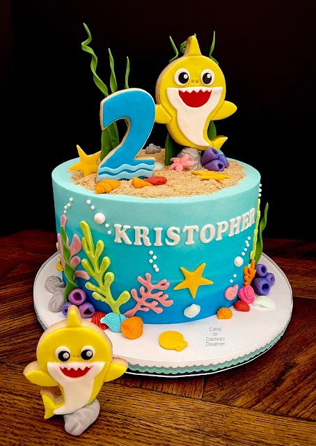 a two year old birthday cake with an ocean theme