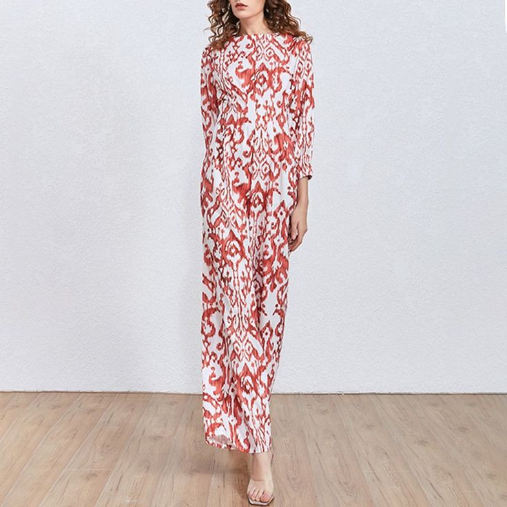 Our stunning Brocade Straight Leg Jumpsuit is a bold and fun piece that adds a pop of color to your wardrobe. Featuring a relaxed fit, three-quarter sleeves, and a vivacious brocade print, this dashing piece is perfectly suited for an elevated daily wear look. Wear to brunch, out on the town, or dress it up for a more formal event. Elegant Stretch Jumpsuits And Rompers For Beach, Elegant Beach-style Stretch Jumpsuits And Rompers, Fitted Printed Jumpsuits And Rompers For Beach, Elegant Long Sleeve Beach Jumpsuits And Rompers, Elegant Printed Fitted Jumpsuits And Rompers, Elegant Fitted Printed Jumpsuit, Fitted Maxi Length Jumpsuit For Beach, Brocade Print, Three Quarter Sleeves