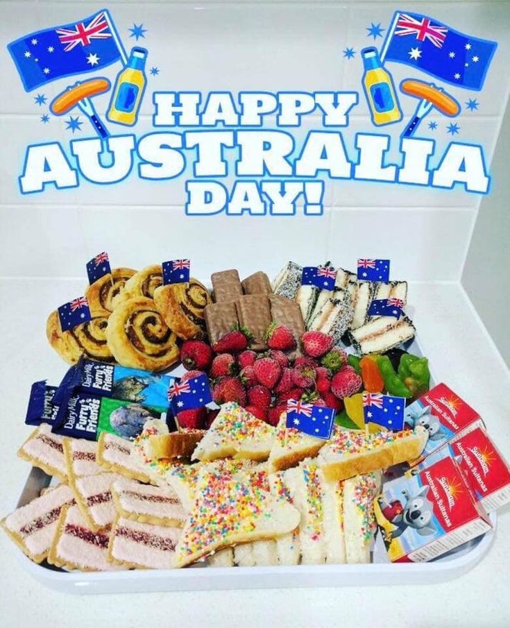 there is a large platter of food with australia day written on the front and side