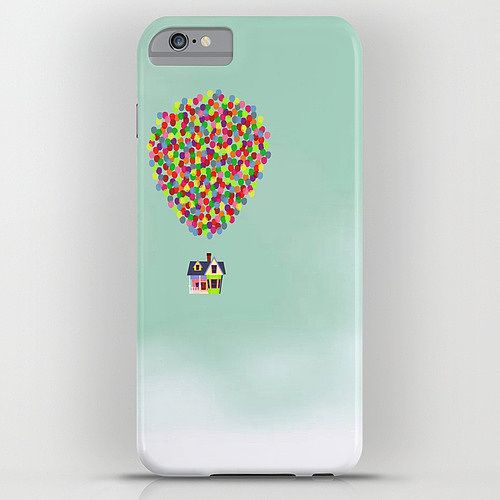 a phone case with a hot air balloon in the shape of a heart on it