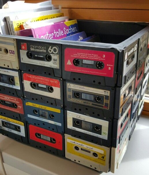 a stack of cassettes sitting on top of a table