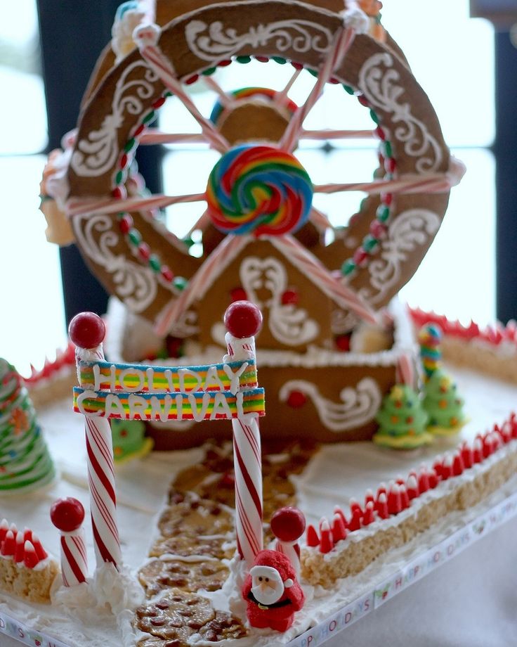 the gingerbread house is decorated with candy canes