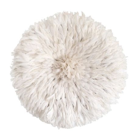 a white fluffy ball on a white background