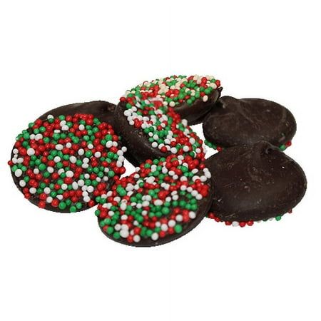 chocolate covered cookies with sprinkles on white background