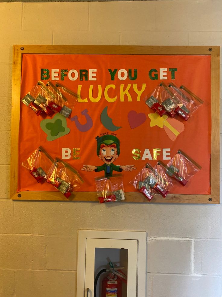 a sign on the wall that says before you get lucky be safe with candy in it