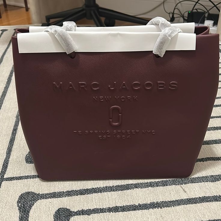 Maroon, Highly Structured Marc Jacob’s Bag. Perfect Color For Fall! Designer Burgundy Shopping Bag, Designer Burgundy Bag For Shopping, Marc Jacobs Logo, Beige Tote, Marc Jacobs Daisy, Marc Jacobs Tote, Nylon Tote Bags, Small Tote Bag, Jacob Black