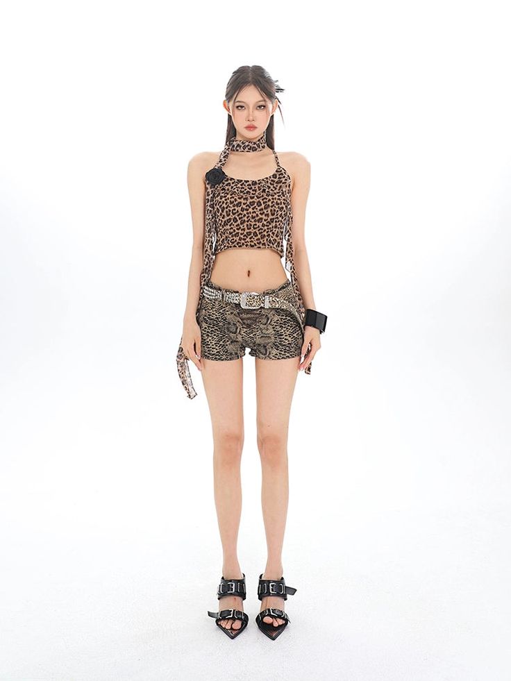 Step out with a confident edge in our Leopard Print Belted Pocket Shorts, a perfect blend of bold pattern and chic design. Crafted from soft, breathable fabric, these shorts are a stylish staple for those seeking both comfort and fashion-forward flair. The leopard print offers a classic yet adventurous aesthetic, while the practical belt and pockets add functionality to these striking bottoms. Easily paired with a simple tank top or a sleek blazer, these shorts are ideal for a casual day out or Adventurous Aesthetic, Simple Tank Tops, Shorts Y2k, Leopard Print Shorts, Pocket Shorts, The Leopard, Chic Design, Shorts With Pockets, Breathable Fabric