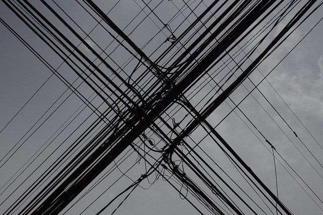 an overhead view of power lines and telephone poles