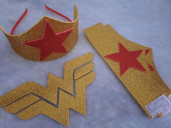 two wonder woman crowns, one gold and one red