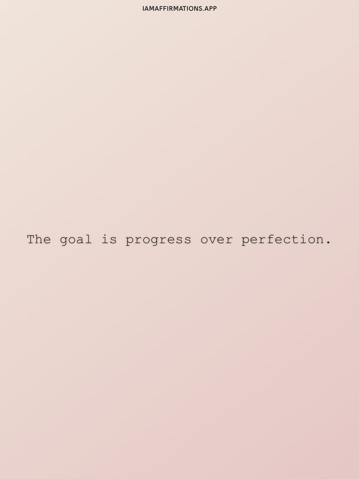 the goal is progress over perfection quote on pink background with black and white text below