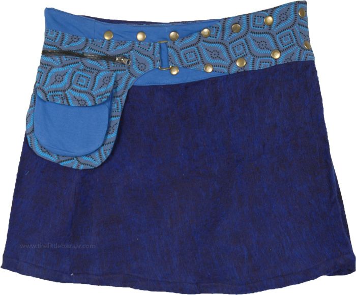 A cute mini skirt with wrap around waist and snap buttons for flexibility in denim blue with cornflower blue belt with utility flap pocket and zipped pouch attached to the waist gives the skirt an edgy look. This skirt is made from 100% wool with a cotton belt, so you can also style it in cool weather with classy boots and a warm coat. The belt print can be different from what is shown in the picture because each skirt is handmade and there are five unique kinds of belt prints. Blue Denim Skirt With Belt Loops, Short Length, Blue Mini Denim Skirt With Belt Loops, Short Blue Denim Skirt With Belt Loops, Blue Mini Length Bottoms With Belt Loops, Fitted Blue Mini Cargo Skirt, Blue Mini Bottoms With Belt Loops, High Waist Blue Mini Skirt With Belt Loops, Blue High Waist Cotton Cargo Skirt, Blue Denim Mini Skirt With Belt Loops