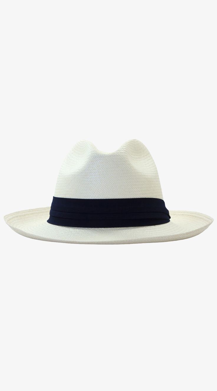 This classic Panama hat is made of Toquilla straw and features a grosgrain band. Handcrafted by skilled artisans in Ecuador. Size Guide: 56-57 cm with adjustable band. One size fits most. To find your hat size measure from the back of your head bringing the ends together at the center of your forehead right above your eyebrows. Black And White Hats, Luxury Sustainable, White Hat, Black Hat, Hats For Sale, Hat Making, Hat Sizes, Resort Wear, Your Head