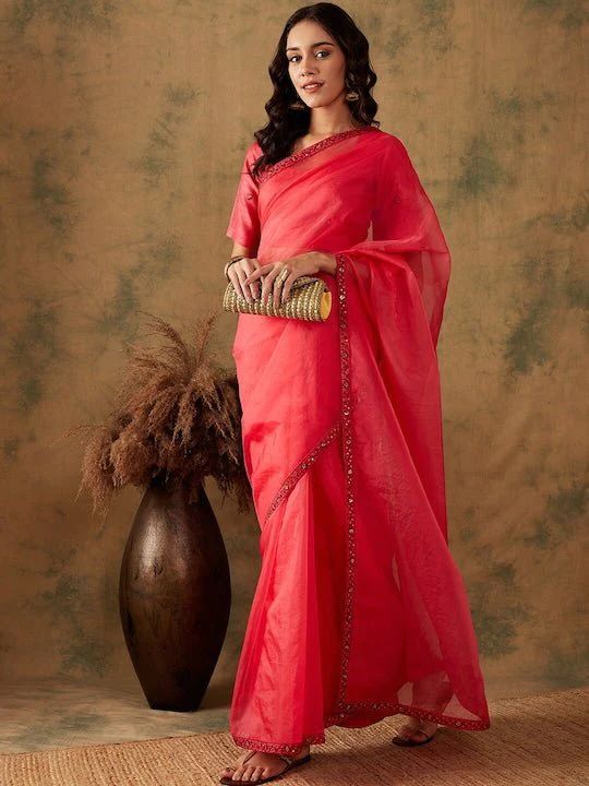 Red sareeSolid saree with embroidered borderThe saree comes with an unstitched blouse pieceThe blouse worn by the model might be for modelling purpose only. Check the image of the blouse piece to understand how the actual blouse piece looks like. Wedding Sarees Online, Wedding Saree Indian, Embroidered Border, Wedding Saree, Rich Fabric, Half Saree, The Model, Indian Design, Wedding Wear