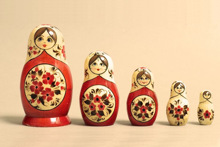 a group of russian nesting dolls sitting next to each other