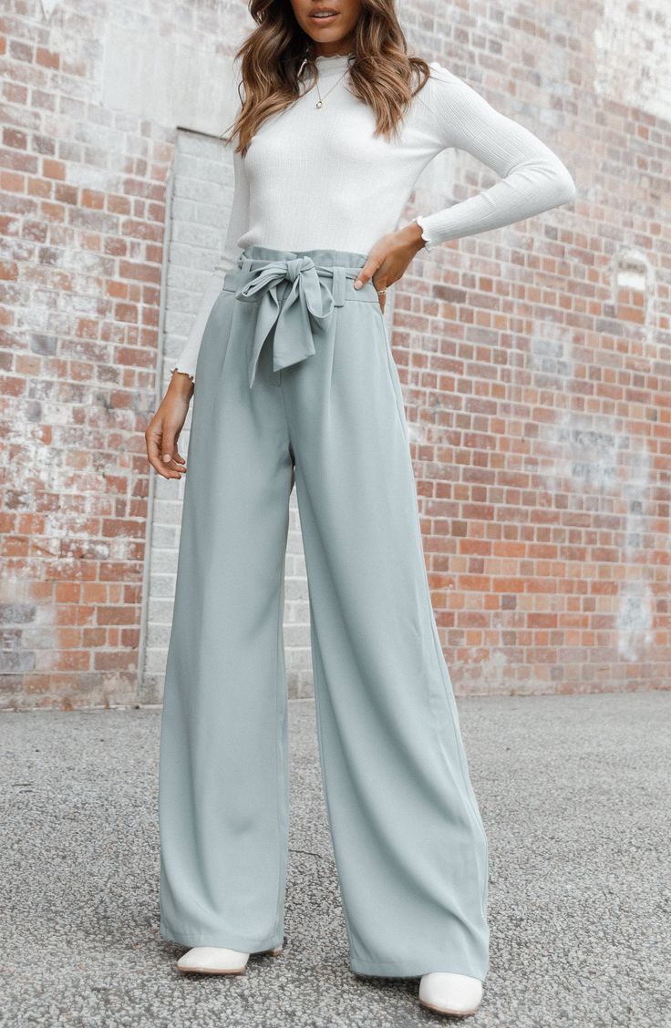 Wide legs punctuate these tailored pants designed with a drapey tie belt and crisp pleats. Zip fly with hook-and-bar closure Front slant pockets Removable tie belt Lined 100% polyester Hand wash, dry flat Imported Spring Business Casual Outfits, Spring Business Casual, Chic Business Casual, Business Casual Outfits For Work, Traje Casual, Elegante Casual, Dresses By Length, Wide Leg Pant, Pantalon Large