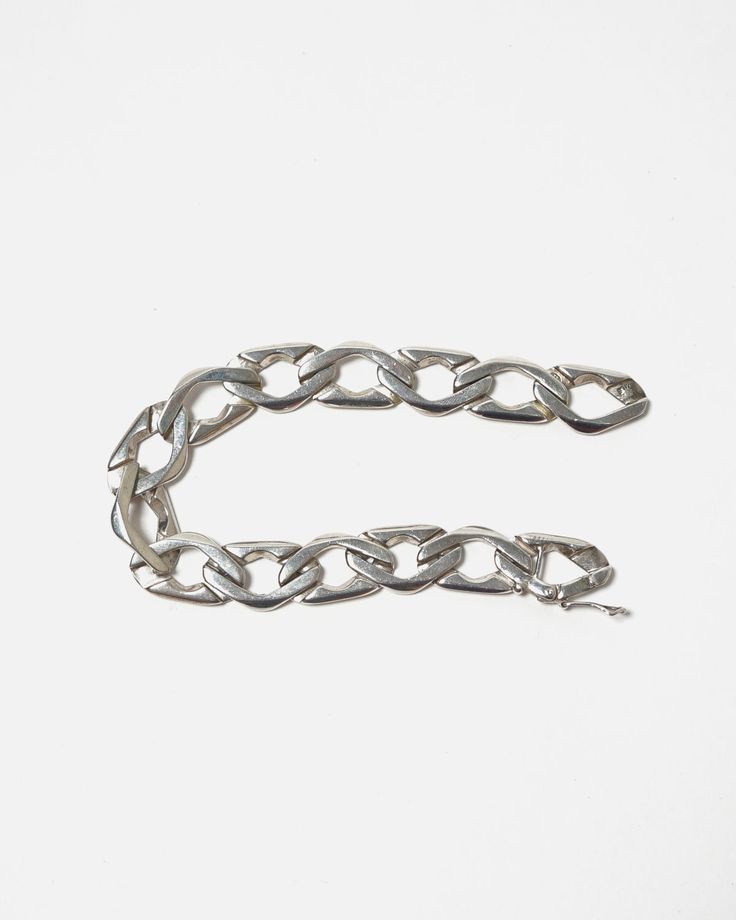 Sterling silver Approx. 8.5" long Classic Metal Bracelet With Oval Link, Classic Metal Bracelets With Oval Link, Classic Oyster Chain Link Bracelet, Classic Polished Chain Link Bracelets, Classic Silver Chain Metal Bracelet, Classic Silver Chain Bracelet, Classic Silver Chain Link Bracelet, Classic Bracelets With Rectangular Silver Chain Links, Classic White Gold Metal Chain Bracelet