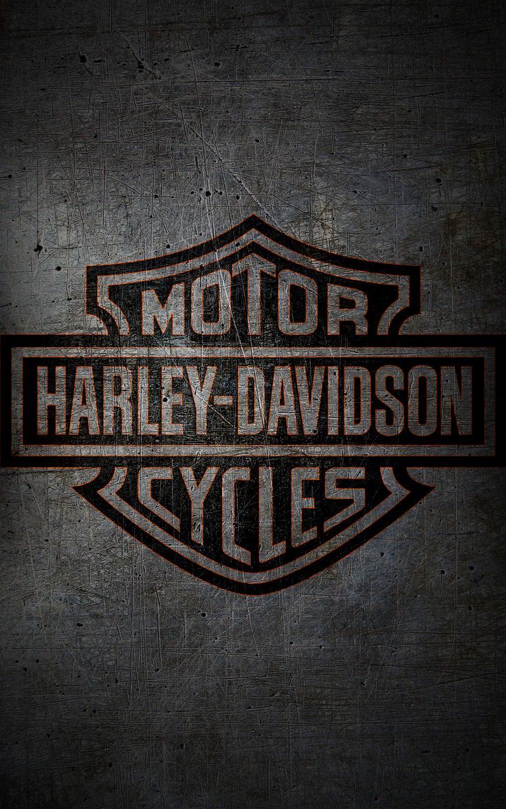 the logo for harley davidson cycles is shown on a dark background with rusted edges