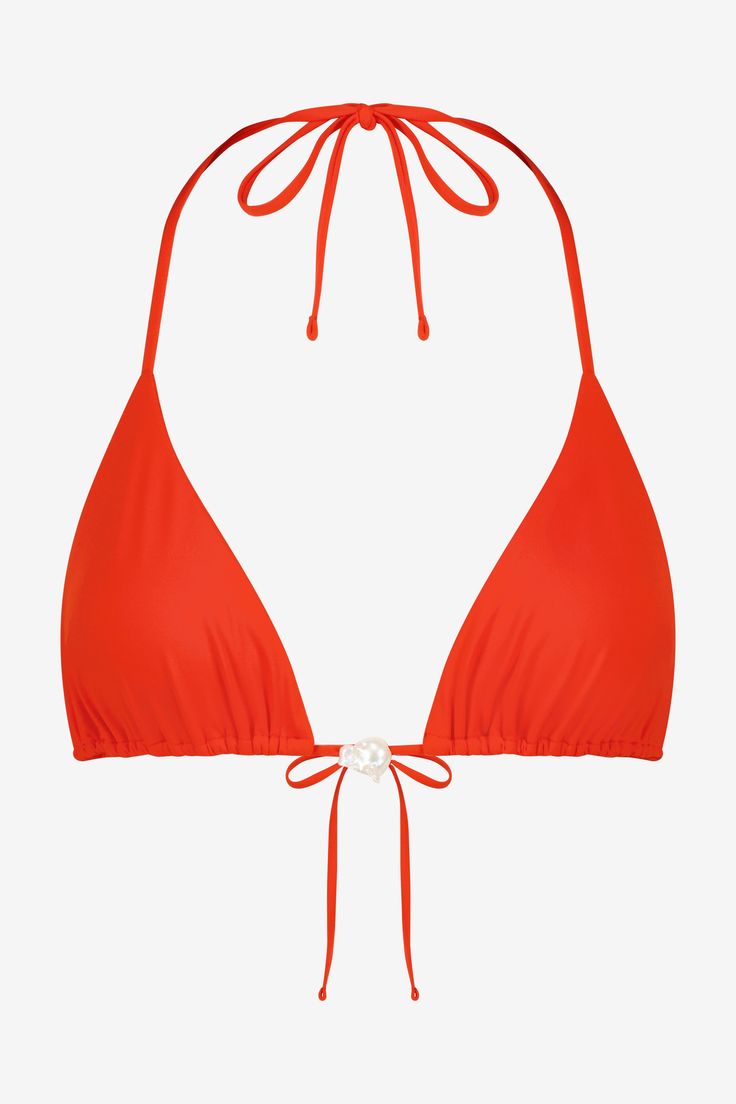 The Triangle bikini by Sara Cristina has a basic yet unique shape and is a must-have in every woman’s wardrobe. This bikini consists of a triangle-shaped top with shoulder straps that tie in the back. It has fully-lined cups and is tailored with seamless stitching. The top features a unique Baroque cultivated pearl from Japan. It is accompanied by a tie-side Latin Brief. 90% Polyamide, 10% ElastaneMade in USAModel is 5'7" (170cm) and wears a size S Gold Swimsuit, Handmade Swimwear, Vermillion Red, Beachy Dresses, Gathered Top, Fall 24, Sustainable Swimwear, Red Swimsuit, The Triangle