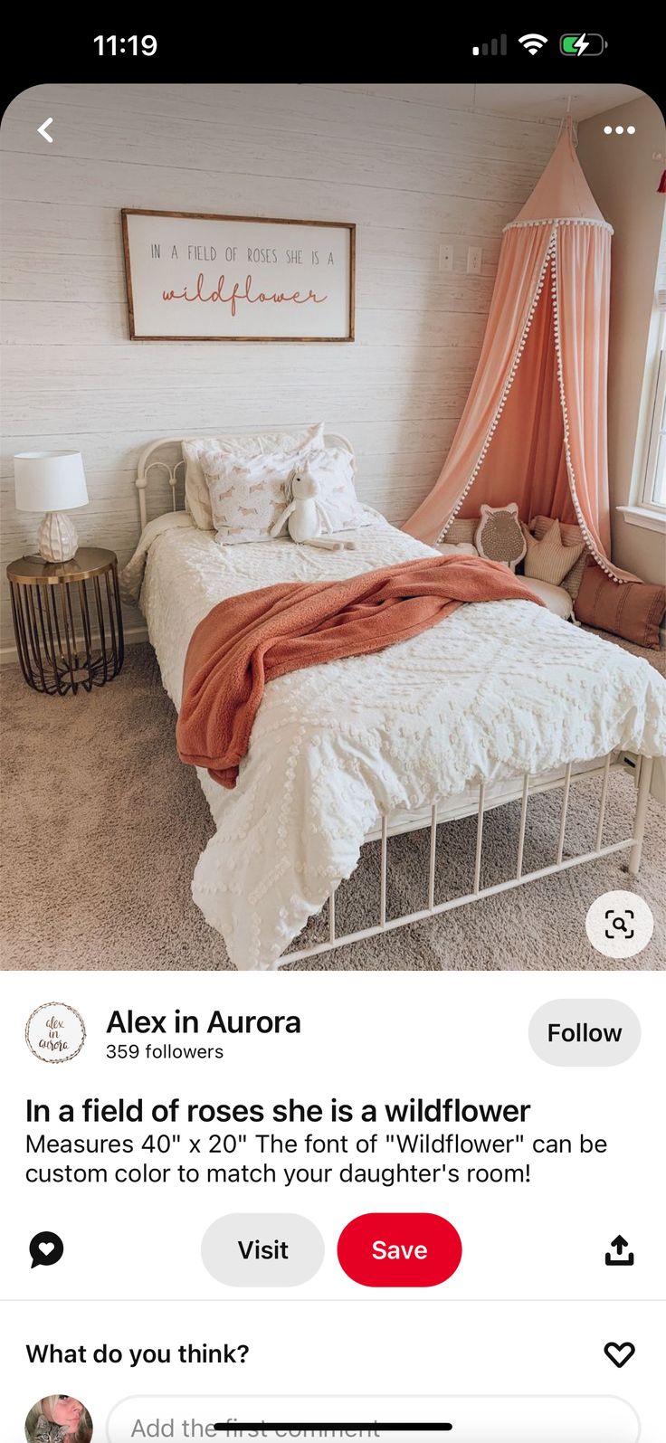 an instagramted photo of a bed in a bedroom with pink and white decor