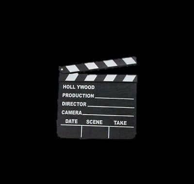 a black and white movie clapper on a black background