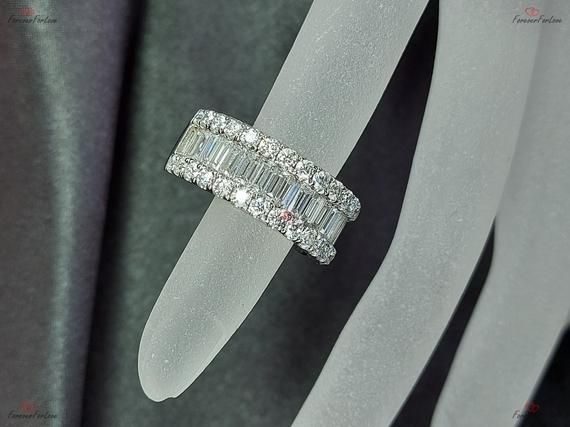 3.5Ct Emerald Cut Eternity Band, Baguette Wedding Band, Moissanite Engagement Ring, Full Eternity Band, Solid 14K White Gold, Wedding Ring, Statement RingHand made and made to order with 100% guaranteed and UK Assay STAMPED 10k/14k/18k gold, rose gold or white gold setting classy Wedding band.---------------------------------------------------------------------------------------------------Each handmade piece is crafted with perfect conflict-free alternative to a mined diamond. We choose the hig Luxury Diamond Eternity Band With Baguette Cut, Luxury Eternity Band With Baguette Diamonds, Luxury Baguette Cut Eternity Band For Engagement, Luxury Baguette Diamond Eternity Band For Engagement, Luxury Baguette Diamond Eternity Band For Women, Luxury Diamond White Eternity Band With Baguette Diamonds, Luxury White Gold Eternity Band For Wedding, Luxury Silver Eternity Band With Baguette Diamonds, Luxury Emerald Cut Eternity Band For Wedding