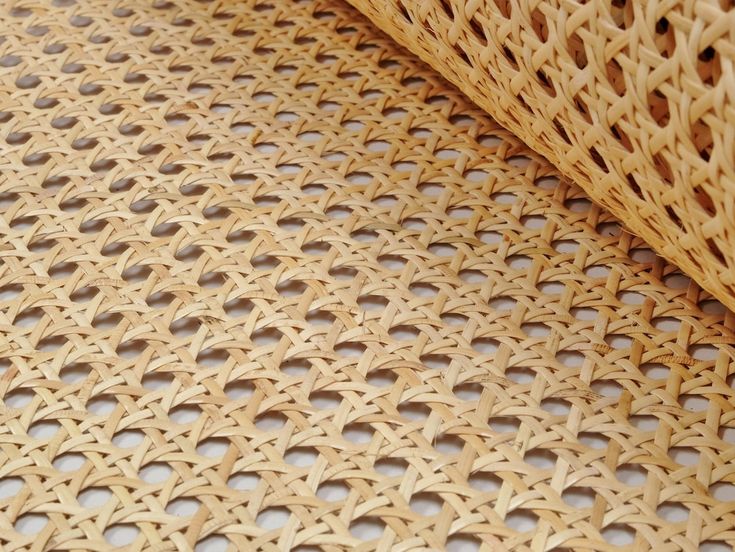 a close up view of a woven material with holes in the center and on the outside