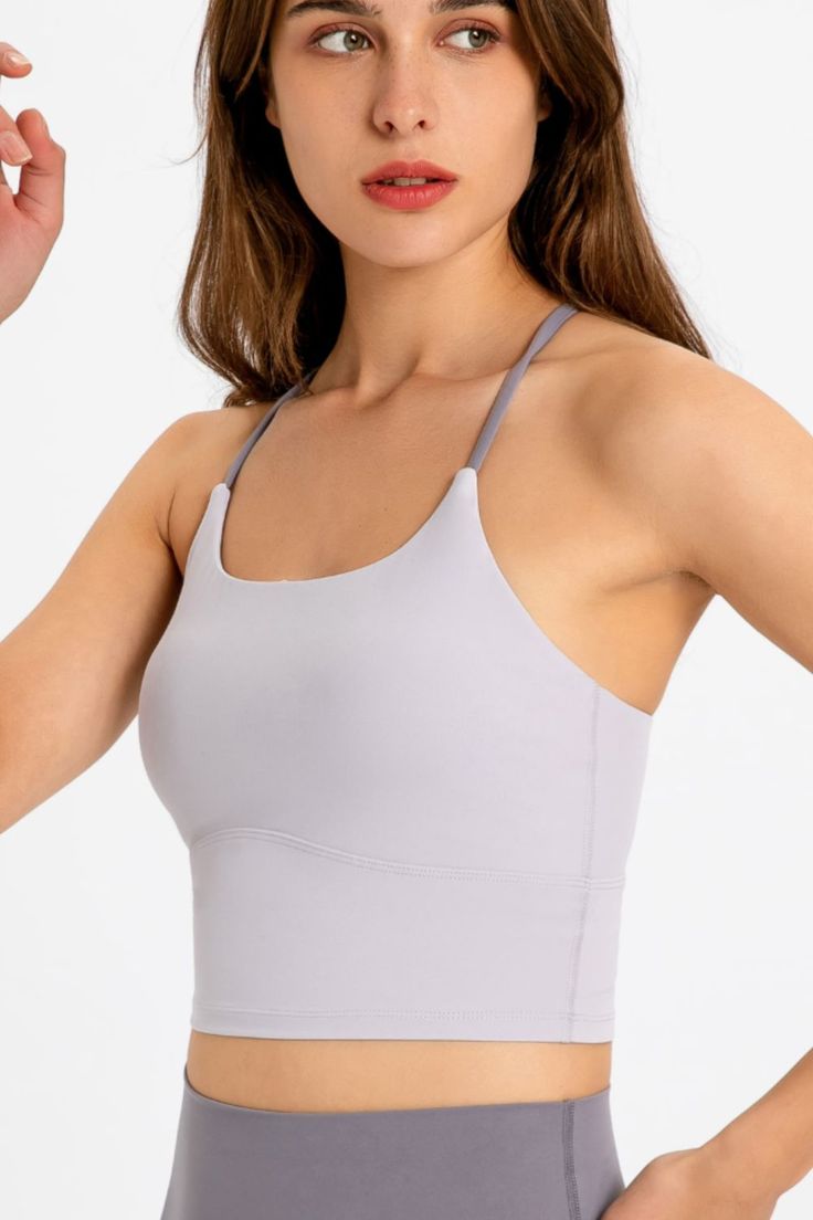 Sizing category: Regular Activity: Yoga Picture style: Studio Pattern type: Solid Features: Feel like skin Neckline: Scoop neck Length: Long Sleeve length: Sleeveless Sleeve type: Sleeveless Material: 80% nylon, 20% spandex Stretch: Highly stretchy Sheer: No Body: Not lined Care instructions: Hand wash cold. Do not tumble dry. Imported Product measurements: 4: length 11 in, bust 27 in, hem 23 in6: length 11 in, bust 28 in, hem 24 in8: length 11 in, bust 30 in, hem 26 in10: length 11 in, bust 31 Gym Tank Top With Built-in Bra And 4-way Stretch, Compressive Seamless Tank Top For Sportswear, Compressive Seamless Sportswear Tank Top, Solid Stretch Cross Back Sports Bra, Solid Color Stretch Sports Bra With Cross Back, Solid Color Stretch Cross Back Sports Bra, Elastane Sports Bra With Adjustable Straps, Scoop Neck Sports Bra With 4-way Stretch, Elastane Scoop Neck Sports Bra For Yoga