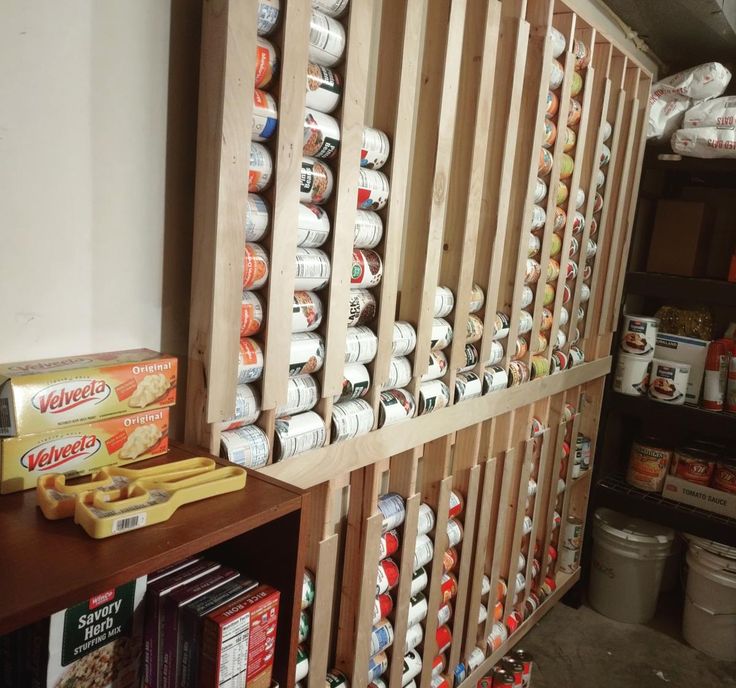 the shelves are filled with many different types of sodas and cans, as well as food