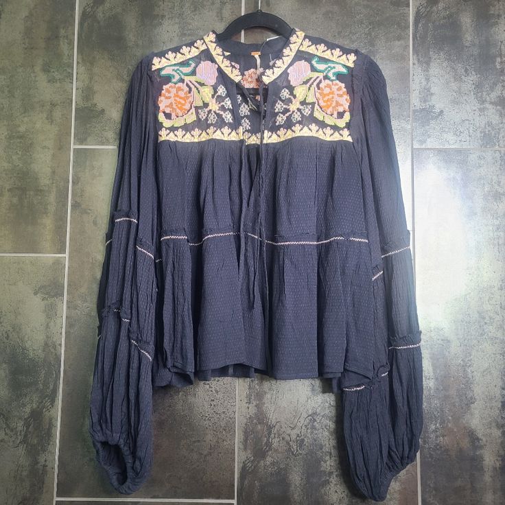 Free People Tunic Boho Blouse Black Large Floral Embroidered Mesh Yoke Brand New Without Tags Black Summer Tops With Intricate Embroidery, Black Embroidered Tops For Summer, Black Tops With Intricate Embroidery For Summer, Black Embroidered Long Sleeve Top For Summer, Black Long Sleeve Embroidered Top For Summer, Black Long Sleeve Embroidered Top, Black Peasant Top For Festival, Black Peasant Top With Floral Embroidery, Black Embroidered Peasant Top