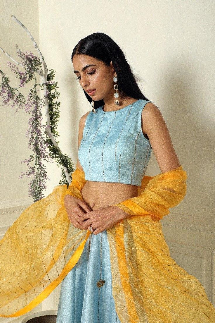 Ash Blue Lehenga Set of 3 - Trendroots Blue Unstitched Organza Choli, Blue Silk Lehenga With Unstitched Blouse, Blue Chanderi Lehenga For Party, Blue Chanderi Choli For Party, Light Blue Chanderi Sets For Festive Occasions, Festive Blue Slub Silk Blouse Piece, Blue Organza Choli For Eid, Blue Party Choli In Chanderi, Festive Light Blue Chanderi Sets