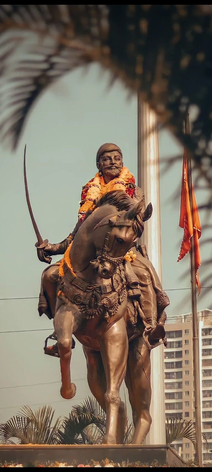 a statue of a man riding on the back of a horse