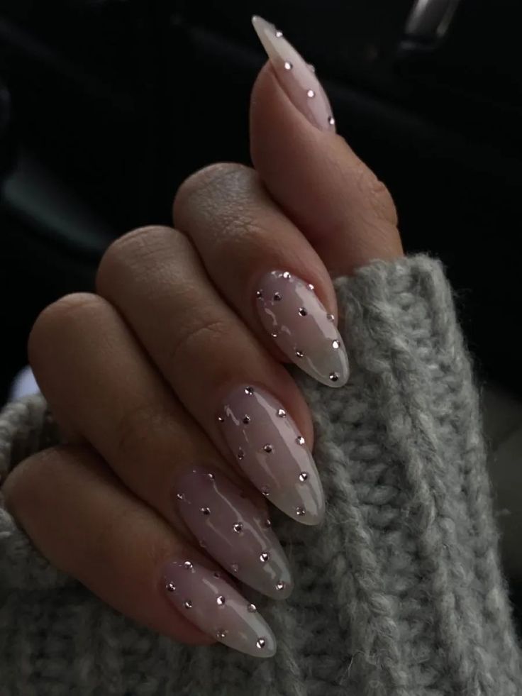 New Years Nails Sparkly Silver, Grey New Years Nails, Holiday Nails With Gems, Black And White Coquette Nails, Nails Inspiration With Charms, Winter Nail Inspo Almond, Pearl Christmas Nails, Nail Inspo Diamonds, Neutral Nails With Rhinestones