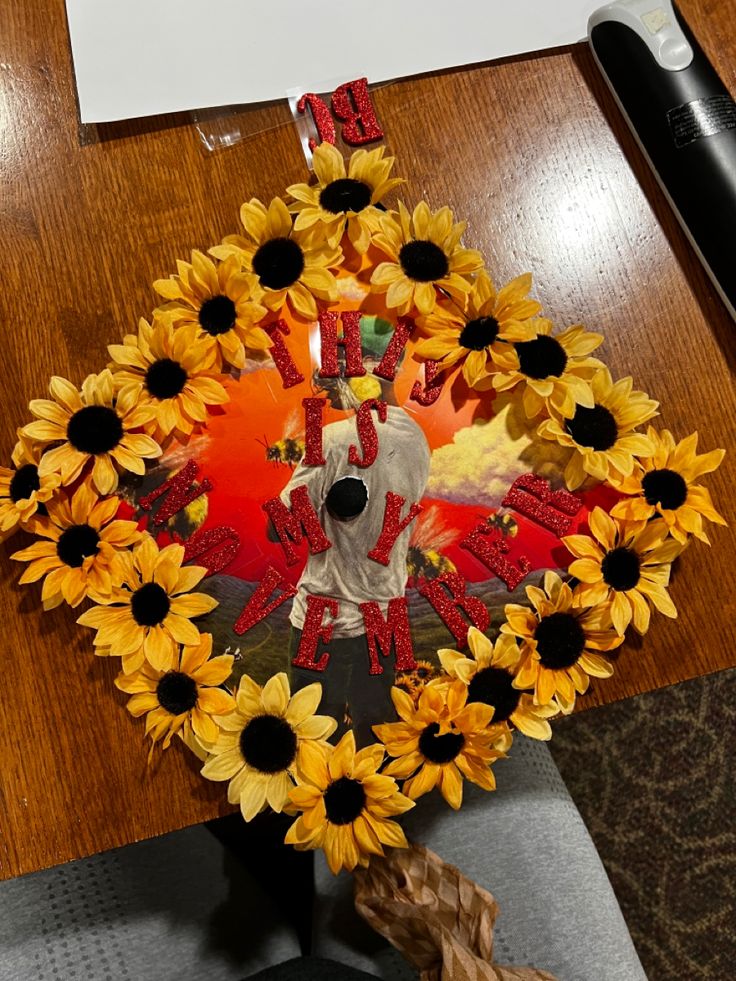 a bouquet of sunflowers with a dog in the center