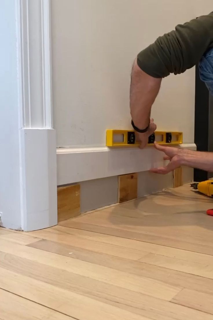 a man that is standing on some kind of floor