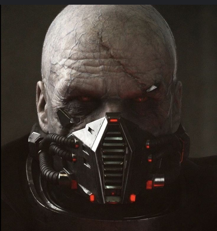 a man wearing a futuristic helmet with red eyes