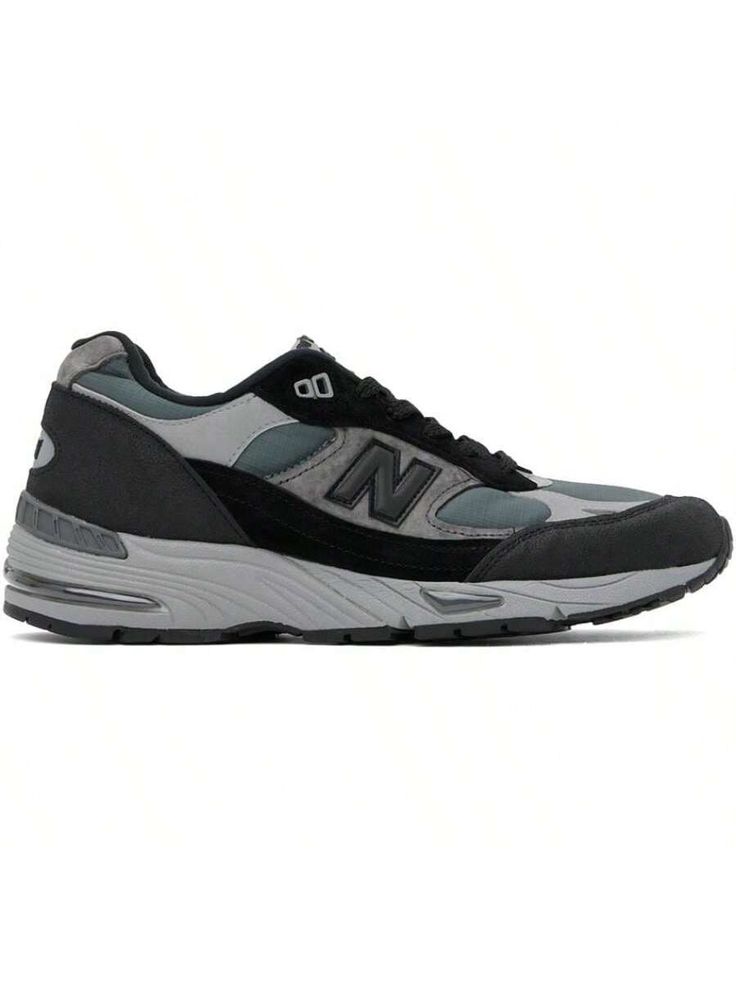 New Balance 
Gray Made In UK 991v1 Sneakers 
Low-top paneled pigskin suede, coated textured leather, ripstop, and rubber sneakers in gray. 
. Lace-up closure 
. Logo embroidered at padded tongue 
. Padded collar 
. Logo appliqué at sides 
. Logo embroidered at heel counter 
. Fleece lining 
. Textured ABZORB® rubber midsole 
. Treaded rubber sole 
Supplier color: Grey 
Upper: pigskin, leather, textile. Sole: rubber. 
Made in United Kingdom. 
241402M237009 
Gray Made In UK 991v1 Sneakers default New Balance Gray, Casual Athletic Shoes, Rubber Sneakers, Pig Skin, Outdoor Shoes, Sports Equipment, Logo Embroidered, Low Top, All Fashion