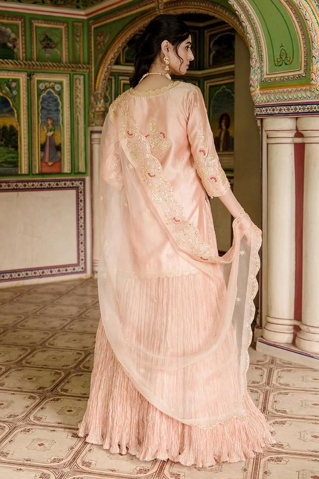 Peach kurta with all over marori floral embroidery and gota embellishments. Comes with can can attached lehenga and dupatta.
Components: 3
Pattern: Embroidered
Type Of Work: Thread, Gota, Marori
Neckline: Notched
Sleeve Type: Three quarter
Fabric: Lehenga and Kurta: Pure Spun Silk, Dupatta: Pure Organza
Color: Peach
Other Details: 
Attached lining
Approx. Product Weight: 2.50kg
Model Height: 5 ft 7 inches, wearing size S
Note: Only selling the product mentioned in description
Occasion: Sangeet,R Peach Lehenga, Kurta Lehenga, Silk Dupatta, Embroidered Silk, Set For Women, Aza Fashion, Model Height, Sleeve Type, Floral Embroidery