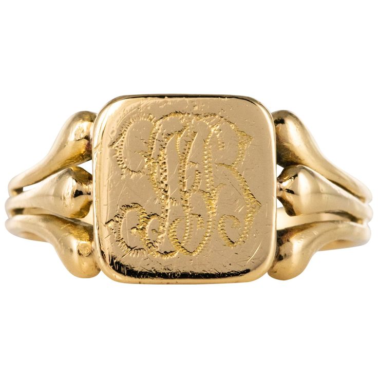 Ring in 18 karat yellow gold, horse's head hallmark. The top of this antique signet ring is square and has the initials J G B. On either side, three openwork palmettes give the start of the ring. Height : 10.3 mm, width : 10 mm, thickness : about 2 mm, width at the base of the ring : 2.6 mm. Total weight of the jewel : approximately 5.5 g. US Size : 9 ; Free resize, please contact us. Authentic antique jewel - French work from the beginning of the 20th century. Patina and small scratches of time Engraved Signet Ring, Antique Gold Rings, Signet Rings Women, Signet Ring Men, Signet Rings, Gold Sign, J G, Gold Signet Ring, Gold Engraving