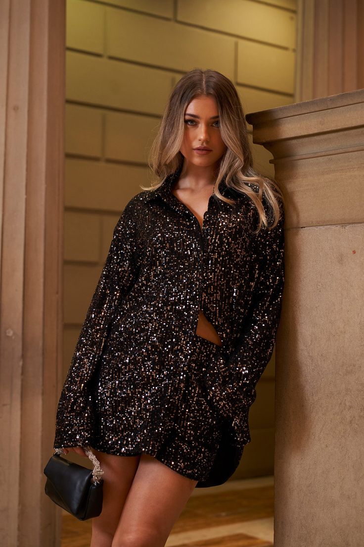 Make a statement with the Oversized Sequin Shirt Co-ord from Unique21. This co-ord set combines comfort and style effortlessly. The oversized sequin shirt is a versatile piece that can be dressed up or down, making it perfect for both casual and dressy occasions. Pair it with the matching shorts for a coordinated look that exudes confidence and a hint of extravagance. It's a bold choice for those who want to showcase their unique fashion sense.