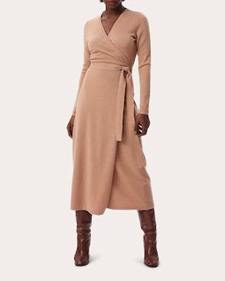 A DVF bestseller, the Astrid dress features a true wrap silhouette crafted from a cozy blend of wool and cashmere. The overlapped V-neckline is mirrored with a slit at the hem for balanced appeal. Pull-on Belted waistline Slit hem 70% wool, 30% cashmere Dry clean only Made in China Size & Fit Garment measurements (size S): 33in bust, 29in waist, 36in hips, 23in sleeve length Fits true to size Size XS: 33.5-34.3in chest, 25.6-26.4in waist, 35.4-36.2in hips Size S: 35.4-36.2in chest, 27.6-28.3in waist, 37.4-38.2in hips Size M: 37.4-38.2in chest, 29.5-30in waist, 39.4-40.2in hips Size L: 40.6-42.9in chest, 32.7-35in waist, 42.5-44.9in hips Size XL: 44.5-46.7in chest, 36.6-39in waist, 46.5-48.8in hips Please note, above measurements reflect Diane von Furstenberg's size chart, not the actual ga Dress With Cardigan Outfit, Wrap Dress Outfit, Dvf Dress, Wrap Sweater Dress, Wool Wrap, Cardigan Outfits, Silhouette Crafts, Wool Dress, Dress With Cardigan