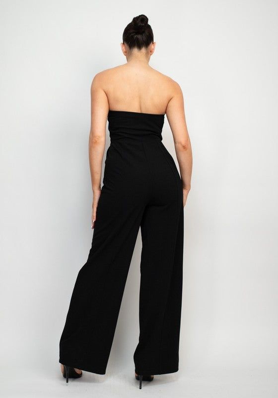 Strapless Wide Leg Jumpsuit Brand: Haute Monde Style: HMP40786 Fabric: 94% POLYESTER, 6% SPANDEX Details: A knit global sleek trend tube jumpsuit in solid color featuring wide leg, princess seams, side pockets, and full-length. Made in Cambodia Stretch Strapless Wide Leg Jumpsuit, Solid Color Strapless Stretch Jumpsuit With Wide Leg, Stretch Strapless Jumpsuit With Wide Legs, Spring Strapless Wide Leg Jumpsuit, Solid Color Strapless Wide Leg Jumpsuit For Party, Fitted Strapless Wide-leg Jumpsuit For Evening, Stretch Bandeau Strapless Jumpsuit, Chic High Waist Strapless Jumpsuit, Chic Stretch Strapless Jumpsuit