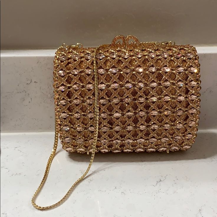 Gorgeous Crystalled Natasha Evening Bag Never Used. Detachable Handle And Extra Crystals Included. Lovely Peach Color. Comes From A Smokefree Home Gold Crossbody Bag For Events, Elegant Gold Crossbody Bag, Elegant Gold Square Shoulder Bag, Chic Embellished Gold Bags, Gold Square Bag For Events, Gold Crossbody Evening Bag For Events, Elegant Gold Crossbody Clutch, Elegant Embellished Square Bag, Gold Box Bag With Removable Pouch For Evening