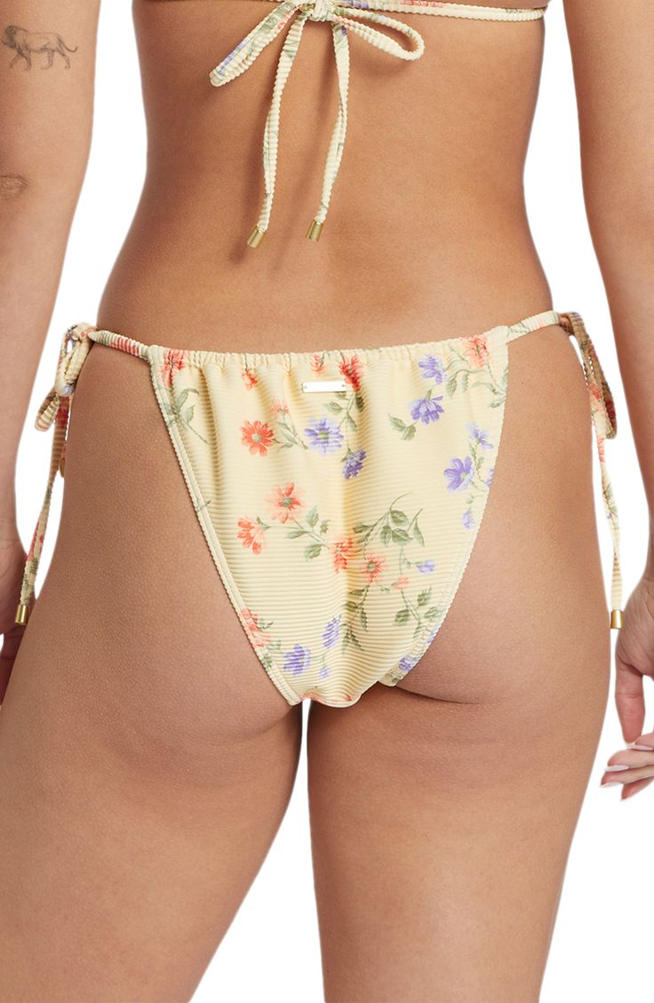 Channel tropical vibes poolside in these side-tie bikini bottoms covered in a tropical pattern. Side ties Cheeky back coverage Lined 91% recycled polyester, 9% elastane Machine wash, dry flat Imported Spring Pool Bottoms With Side Ties, Bottoms With Side Ties For Pool In Spring, Spring Swim Bottoms With Side Ties, Vacation Drawstring Bottoms For Sunbathing, Drawstring Bottoms For Sunbathing On Vacation, Beachy Tie-side Bottoms With Floral Print, Beachy Floral Print Tie-side Bottoms, Summer Bottoms With String Tie For Sunbathing, Adjustable Tie Back Bottoms For Vacation