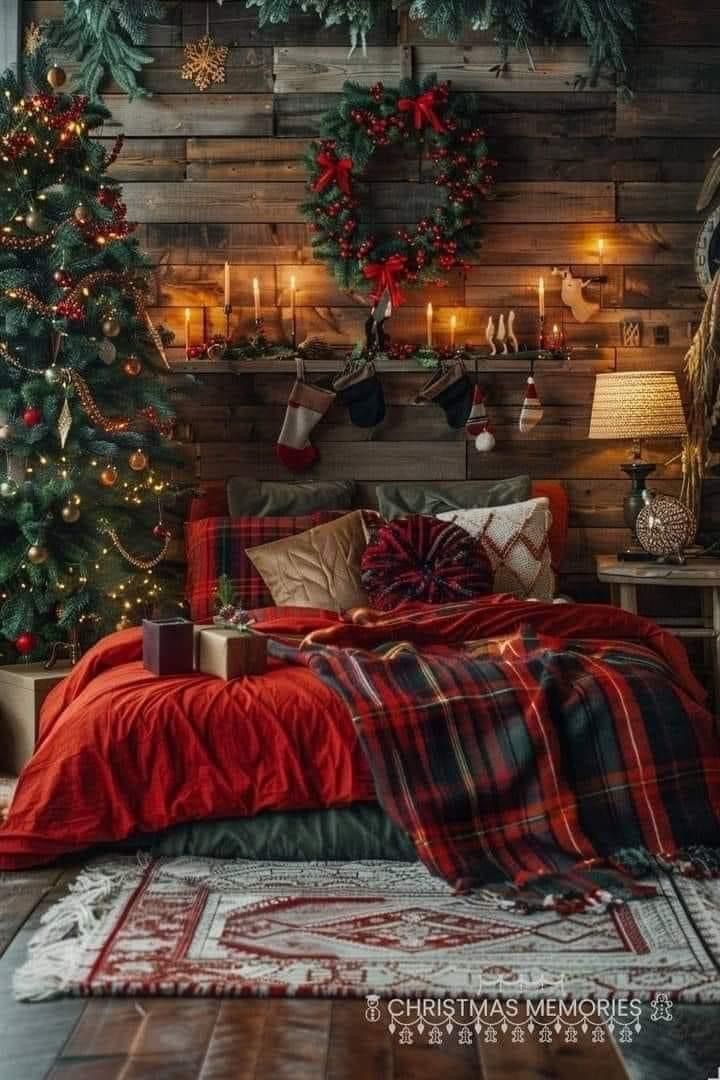 a bedroom decorated for christmas with red and green decorations on the headboard, plaid bedding, candles and wreaths