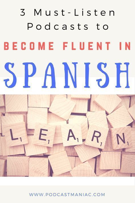 the words learn in spanish surrounded by wooden blocks