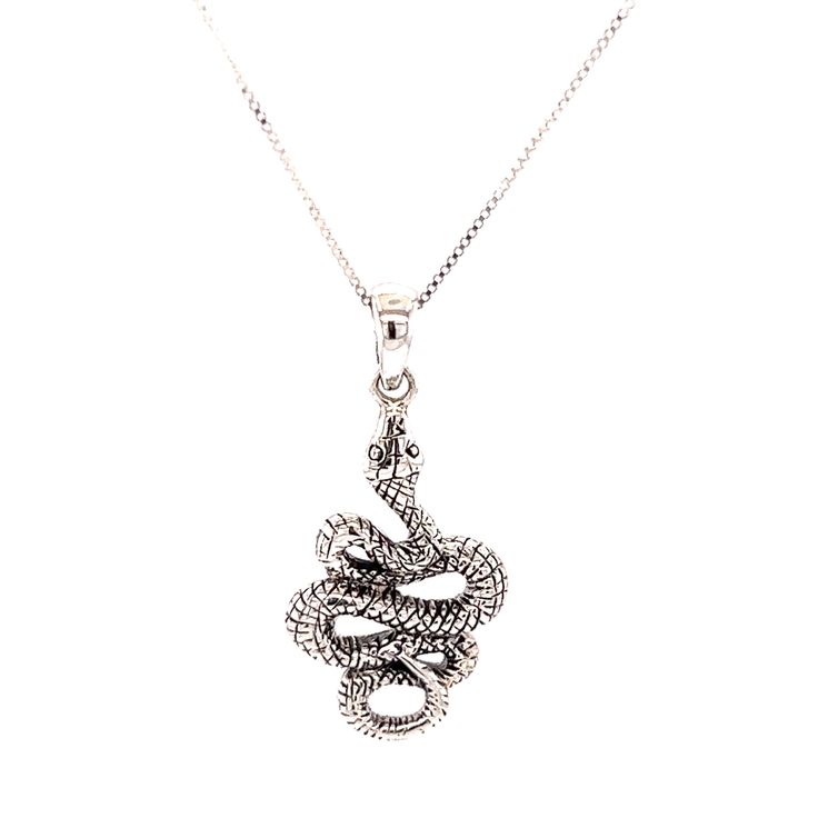 This slithering snake pendant features a detailed and enchanting design. The pendant is sterling silver and handcrafted by one of our expert artisans. Bewitchingly eye-catching and ideal for everyday. The snake symbolizes transformation, wisdom, healing, and protection; It is a talisman that brings luck and prosperity to its wearer. .925 Sterling Silver Approximately 1.25" long Adjustable Symbolic Snake-shaped Jewelry, Spiritual Engraved Jewelry With Snake Chain, Snake-shaped Engraved Jewelry Gift, Symbolic Snake Necklace As A Gift, Symbolic Snake-shaped Necklace For Gift, Symbolic Engraved Snake Chain Jewelry, Symbolic Snake Shaped Necklace For Gift, Nickel-free Snake-shaped Jewelry Gift, Engraved Snake-shaped Jewelry Gift